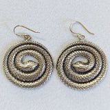 Coiled snake earrings, brass