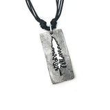 Pewter Pine tree cutout necklace on leather cord.