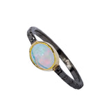 Opal ring in vermeil setting on rhodium band