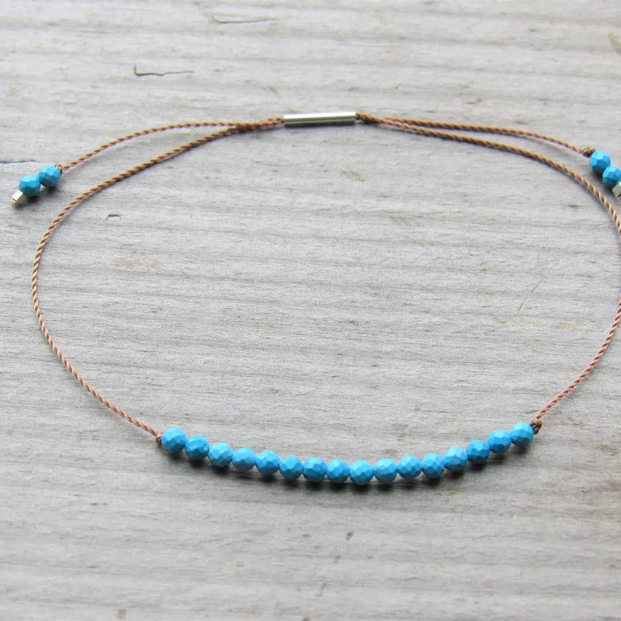 Gemstones on adjustable cord bracelets, assorted stones